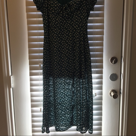Flowy dark Green dress with white flowers. - Picture 2 of 8